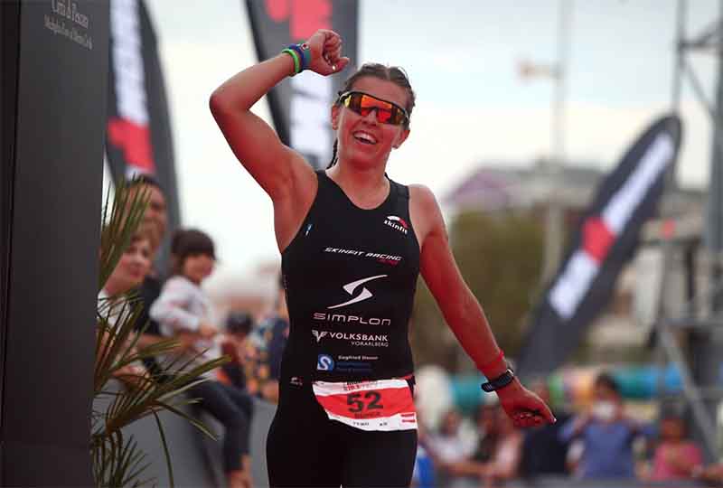Bianca Steurer feiert ihren zweiten Platz beim IRONMAN 70.3 Pescara | Photo by Charlie Crowhurst/Getty Images for Ironman